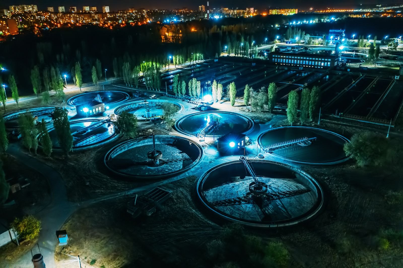 Water treatment plant illuminated at night